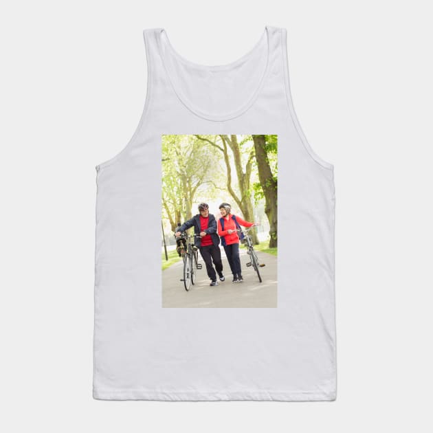 Active senior couple walking bicycles in park (F023/0128) Tank Top by SciencePhoto